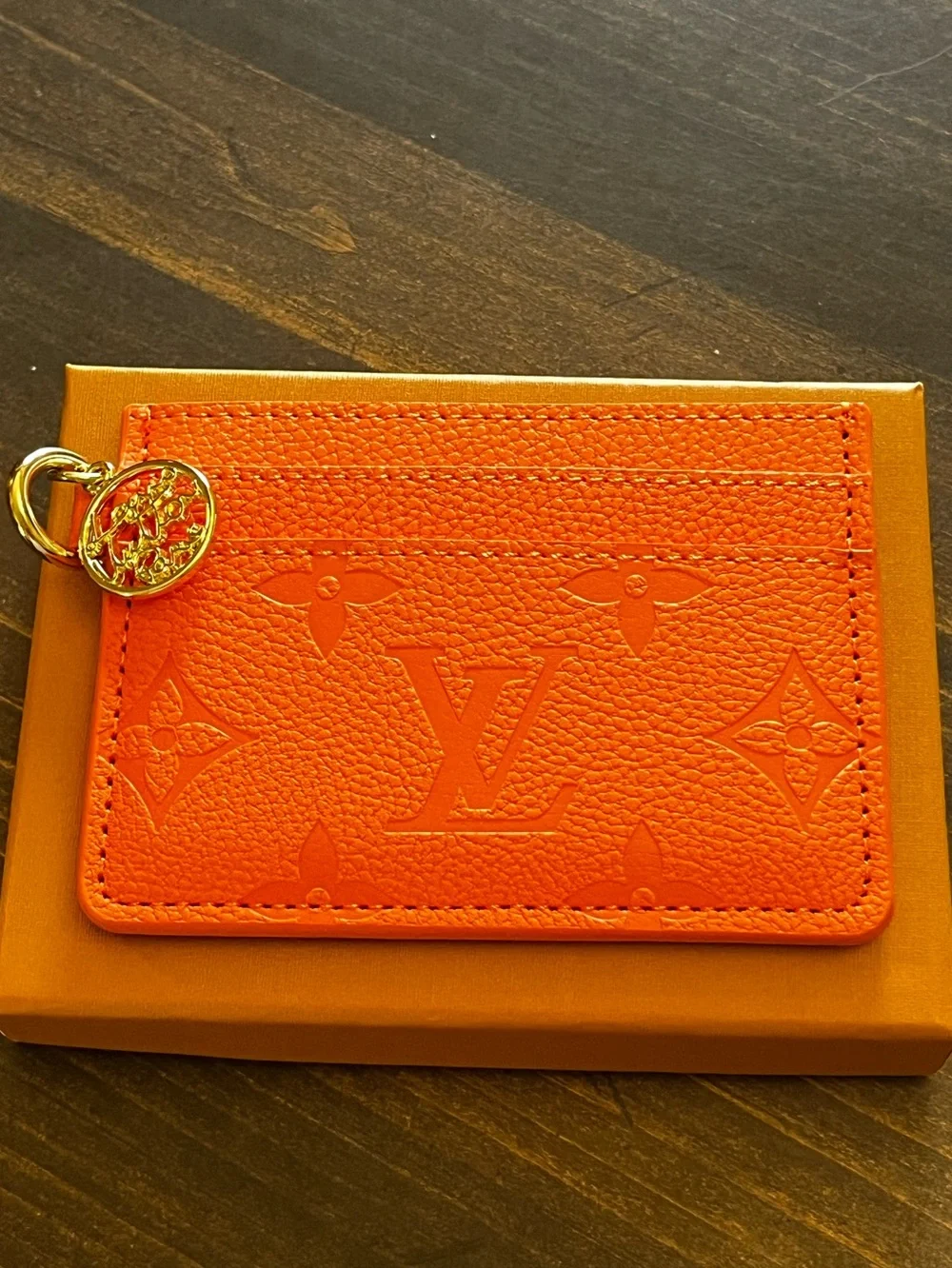 🧡 Louis. Vuitton. Vibrant Orange Gold Tone Charm Letter Monogram Card Holder